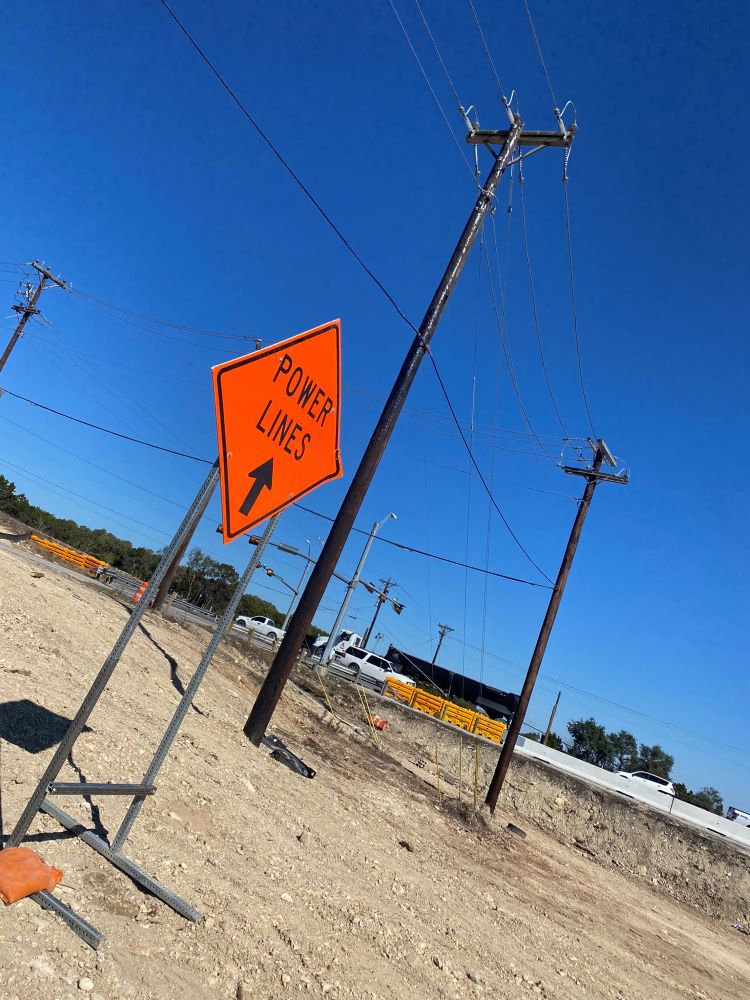 This temporary safety signage near US 290 and South View Road helps serve as a reminder to the team about the location of nearby power lines. This is one of many proactive safety measures being taken to avoid unnecessary utility outages during constructio