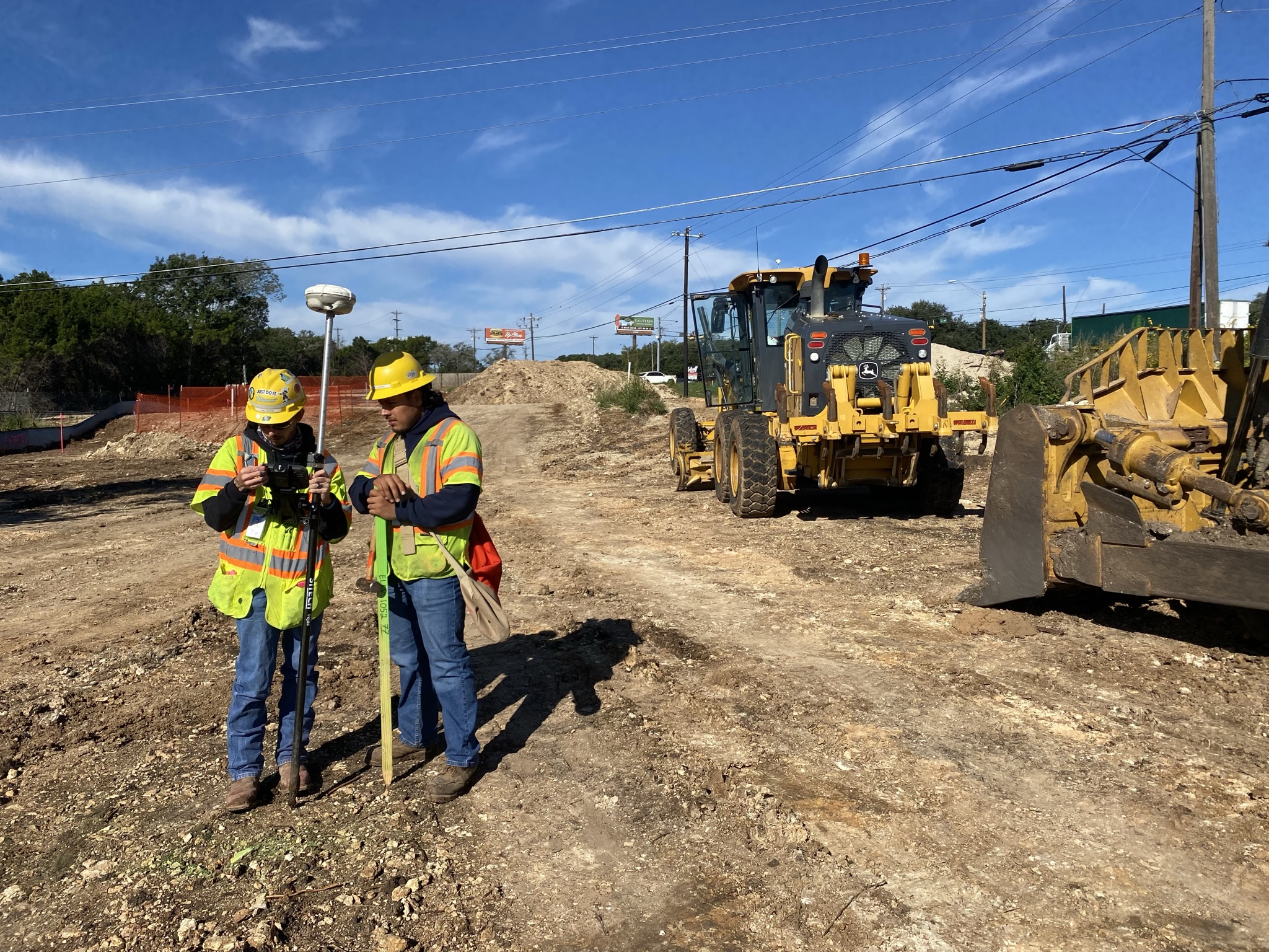 Our surveyors use a GPS stick to pinpoint job site coordinates. This helps the construction crew follow the boundaries of detailed engineering plans. October 2021
